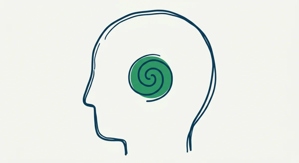 a simple head outline with a small spiral inside